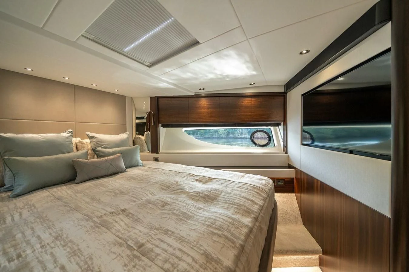 a room with a bed and a large window aboard 76 YACHT Yacht for Sale