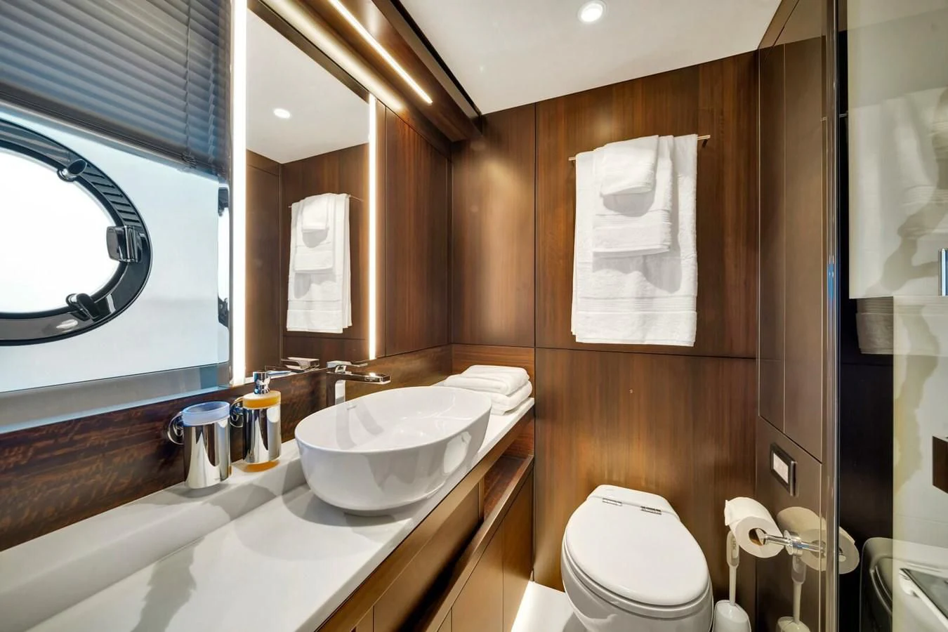 a bathroom with a sink toilet and a bathtub aboard 76 YACHT Yacht for Sale