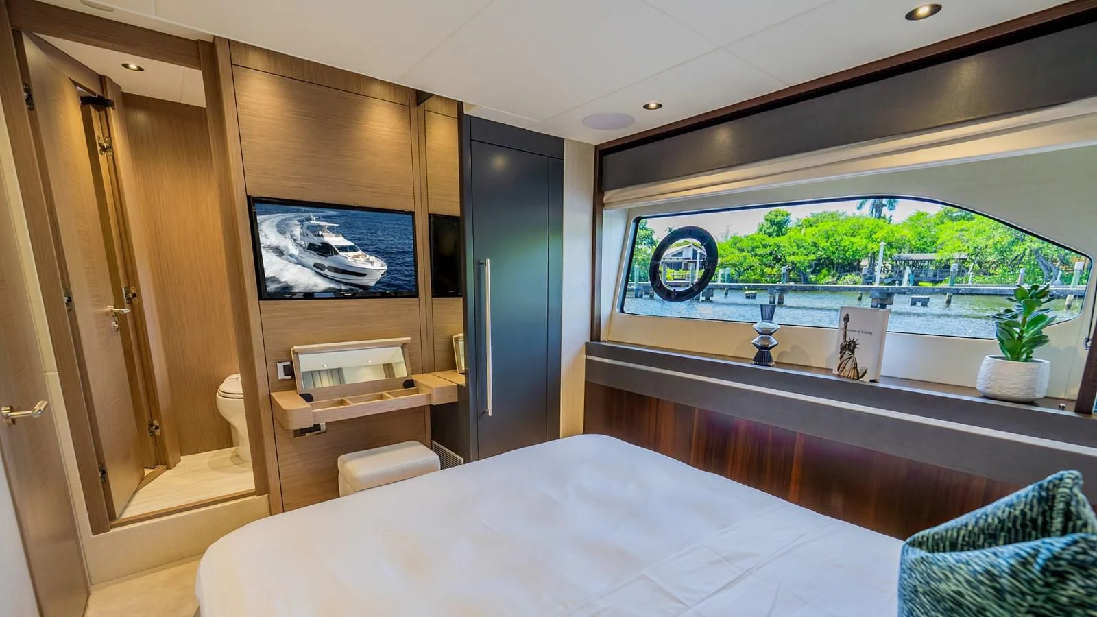 a room with a bed and a window aboard 76 YACHT Yacht for Sale