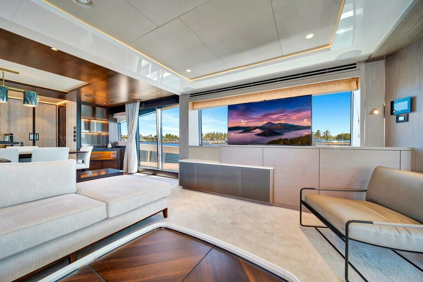 a living room with a large screen aboard 76 YACHT Yacht for Sale
