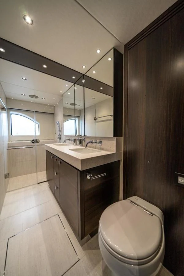 a bathroom with a sink and a toilet aboard 76 YACHT Yacht for Sale