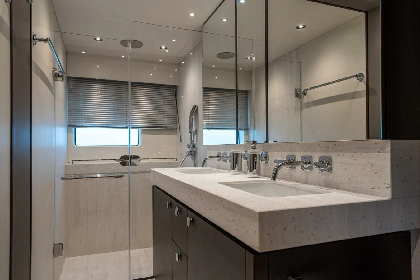a bathroom with a sink and a mirror aboard 76 YACHT Yacht for Sale