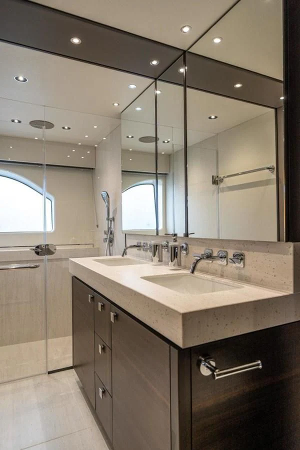 a bathroom with a large mirror aboard 76 YACHT Yacht for Sale