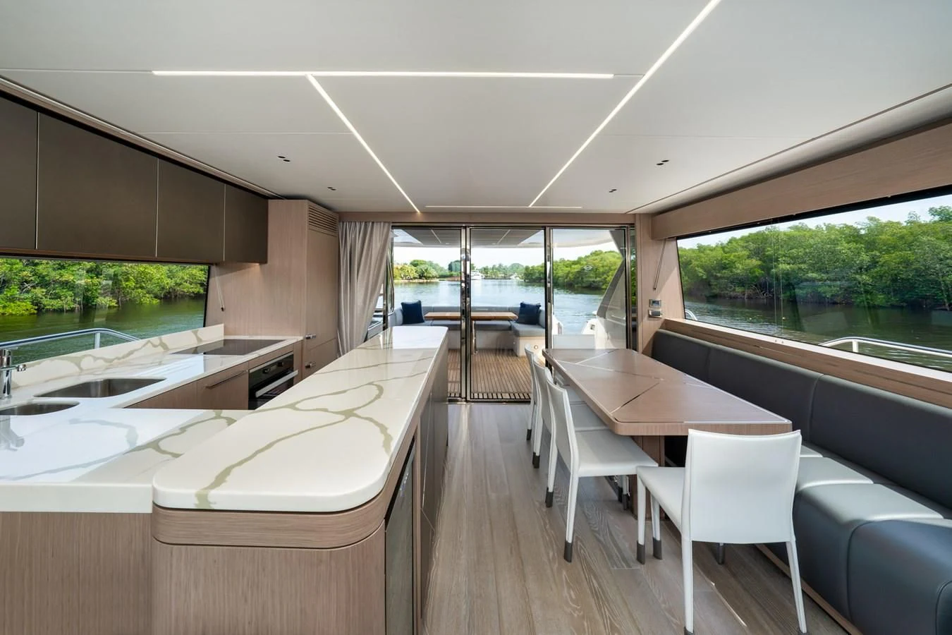 a room with tables and chairs aboard 76 YACHT Yacht for Sale
