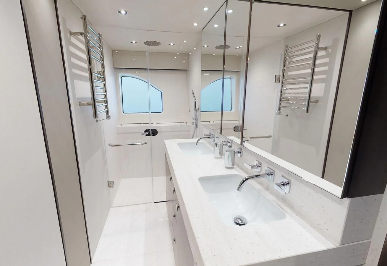 a bathroom with a large mirror aboard 76 YACHT Yacht for Sale