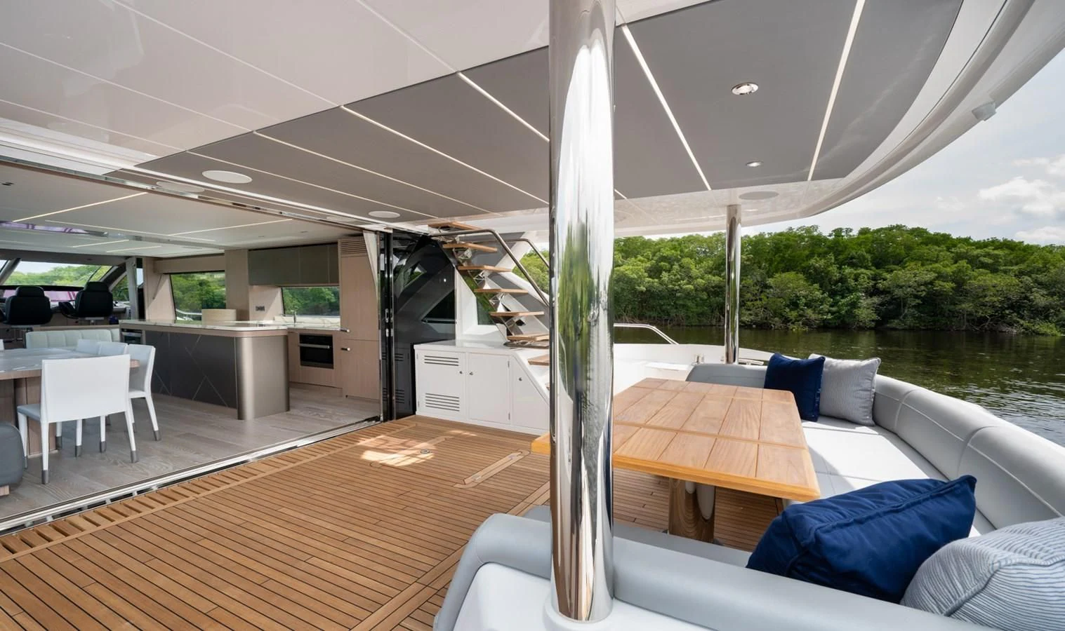 a large glass vase on a table aboard 76 YACHT Yacht for Sale