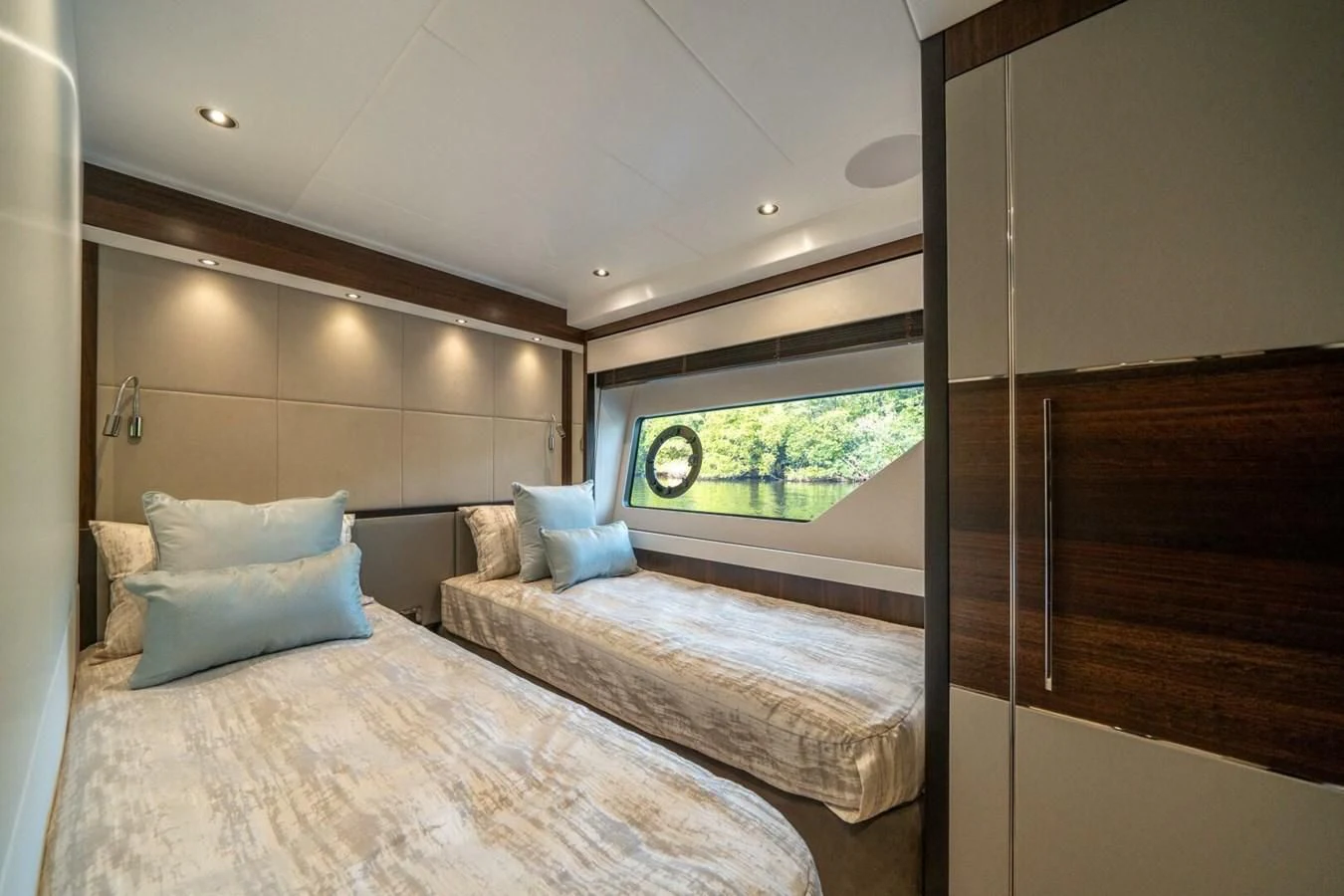 a room with a bed and a window aboard 76 YACHT Yacht for Sale