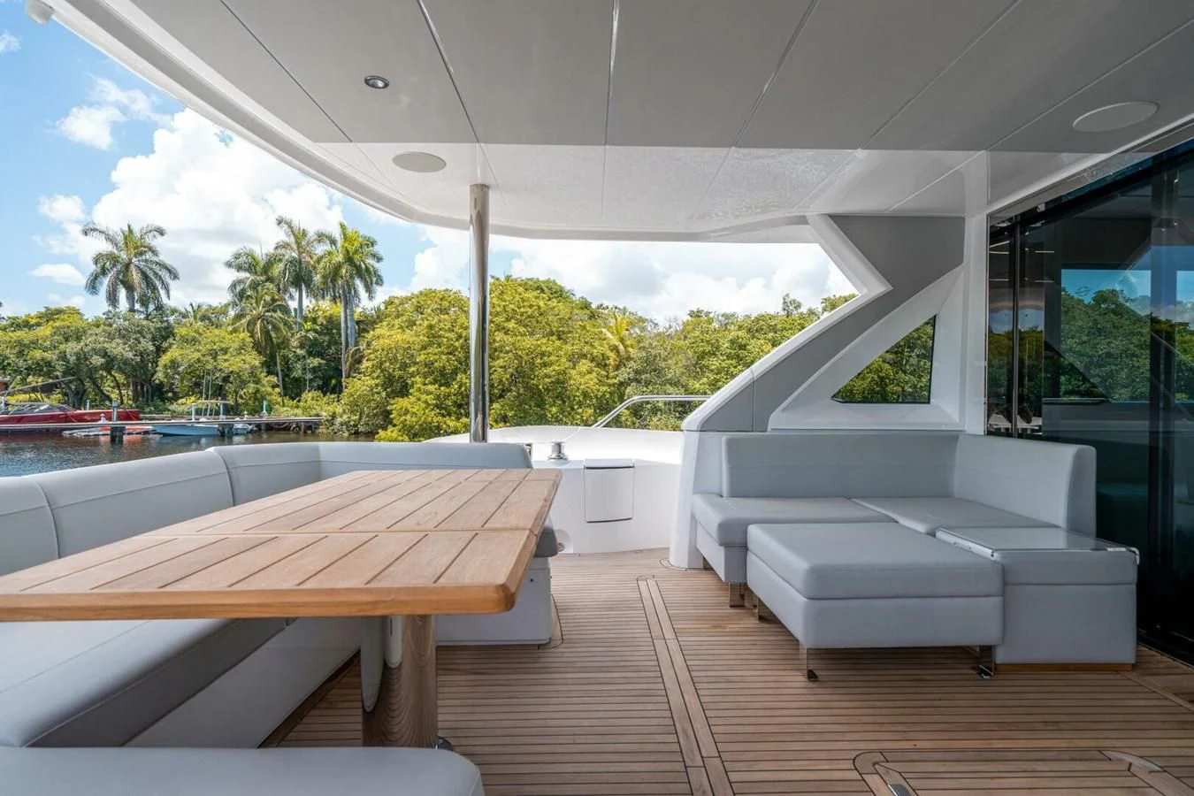 a room with a table and chairs aboard 76 YACHT Yacht for Sale