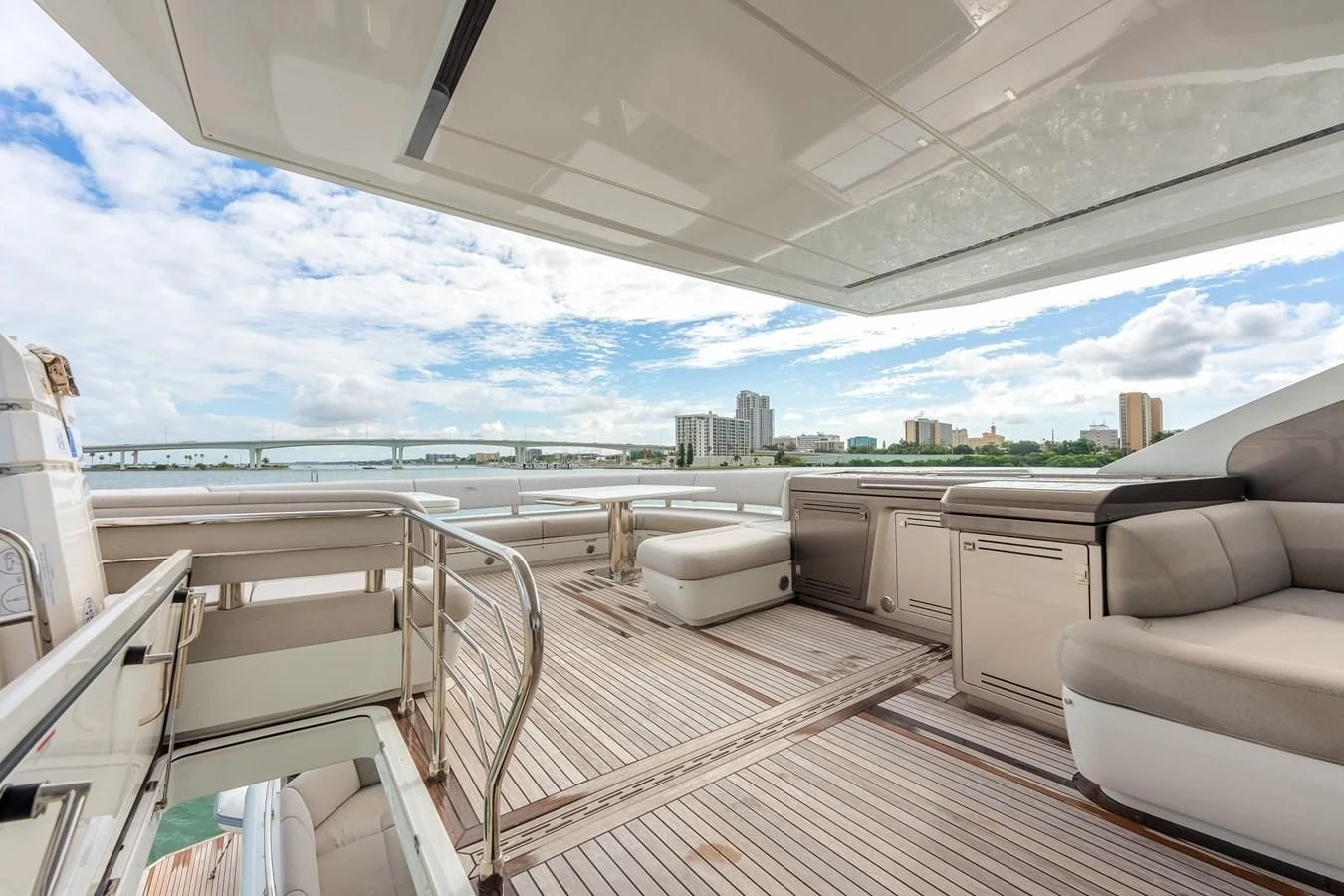 a deck with a view of a city and water aboard 76 YACHT Yacht for Sale