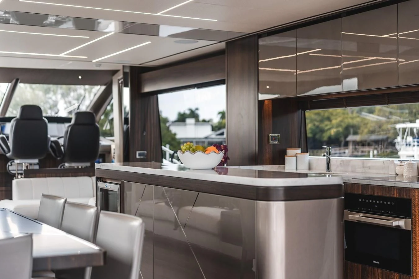 a room with tables and chairs aboard 76 YACHT Yacht for Sale