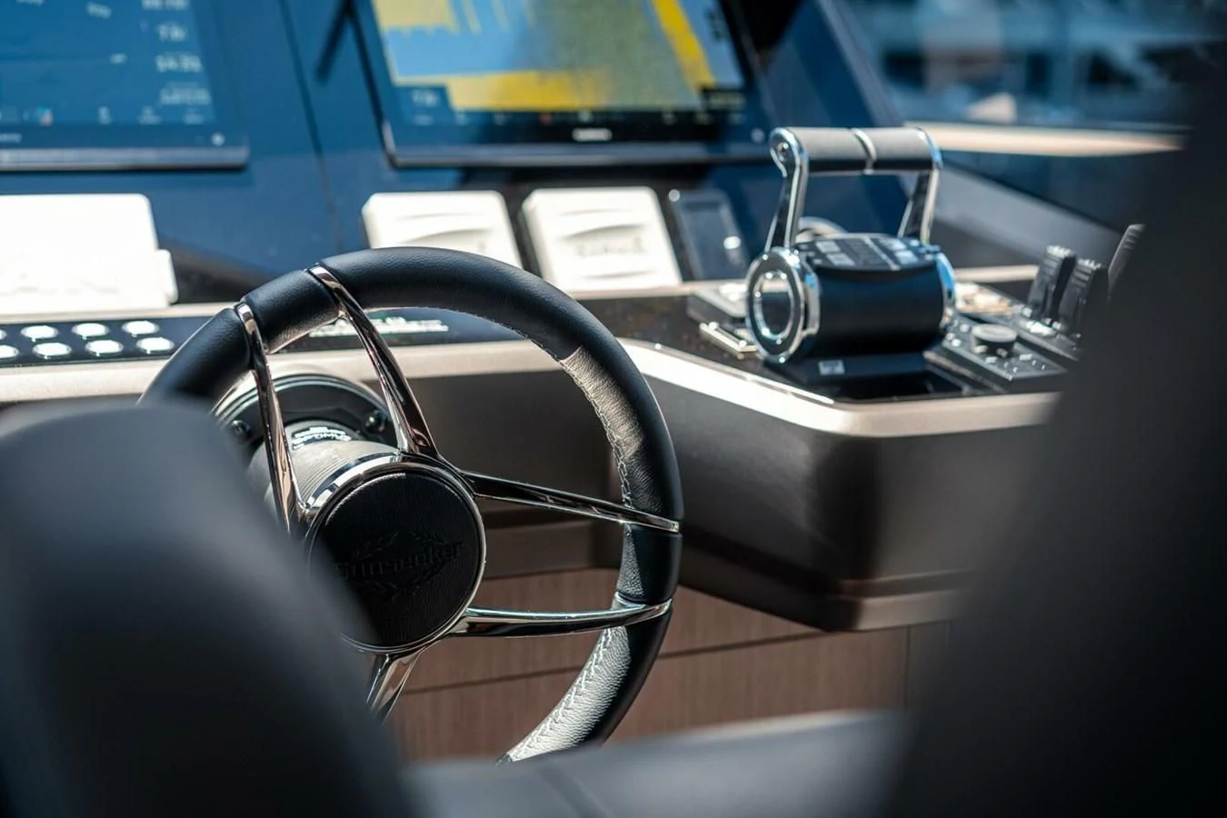 a close-up of a car steering wheel aboard 76 YACHT Yacht for Sale