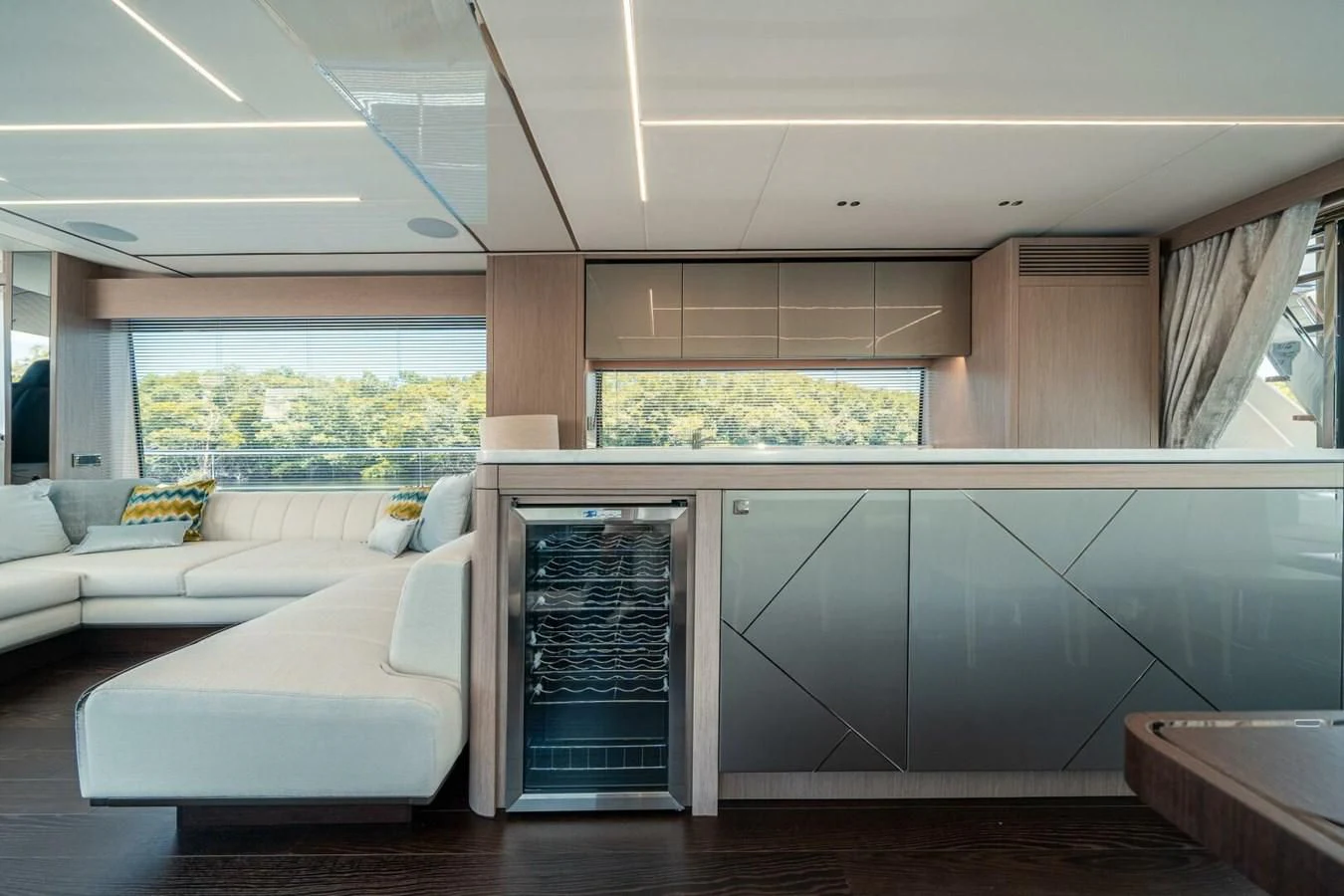 a room with a fireplace and couches aboard 76 YACHT Yacht for Sale
