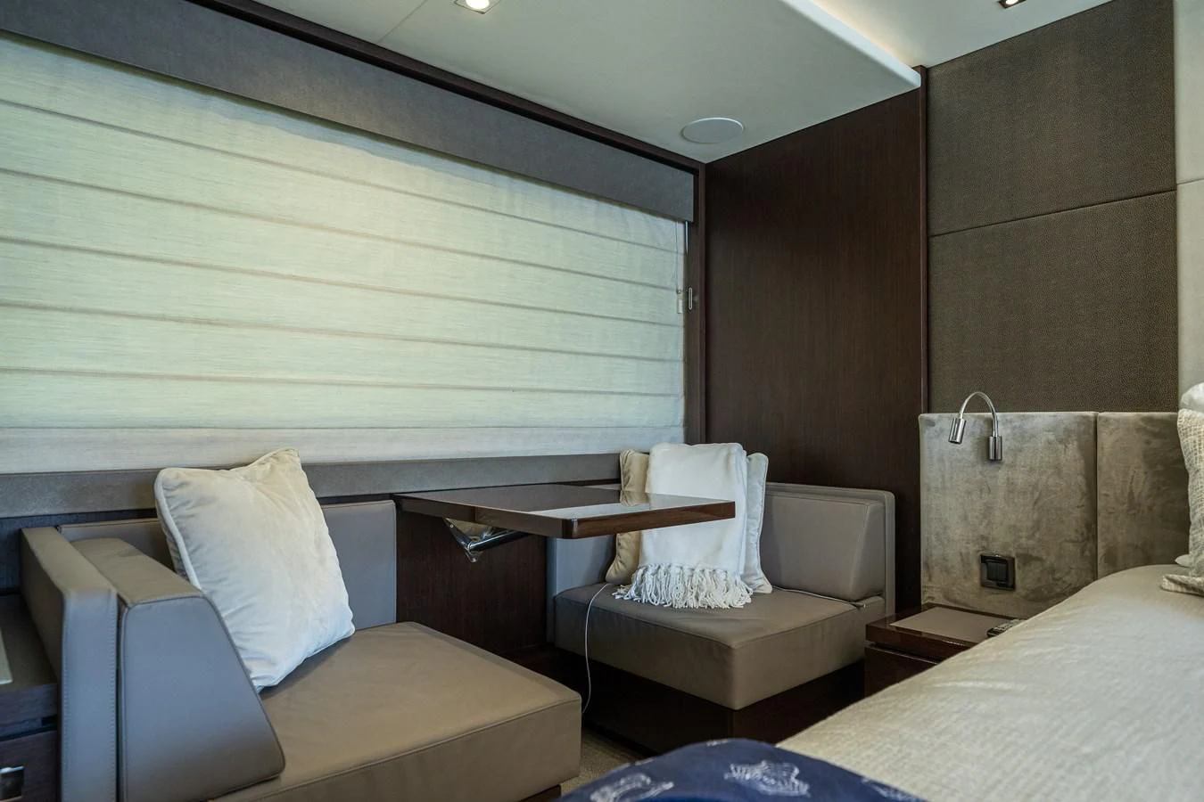 a room with a bed and a chair aboard 76 YACHT Yacht for Sale