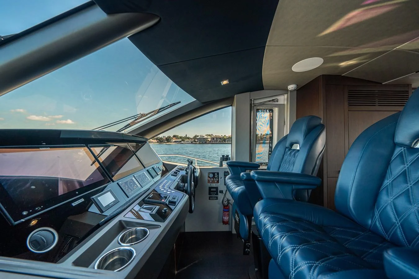 inside of a vehicle with a view of the water and the land below aboard 76 YACHT Yacht for Sale