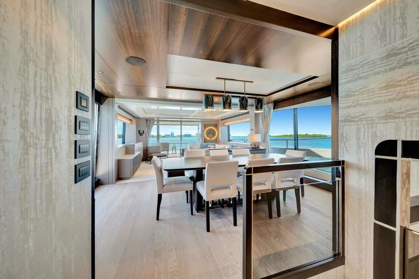 a room with a table and chairs aboard 76 YACHT Yacht for Sale