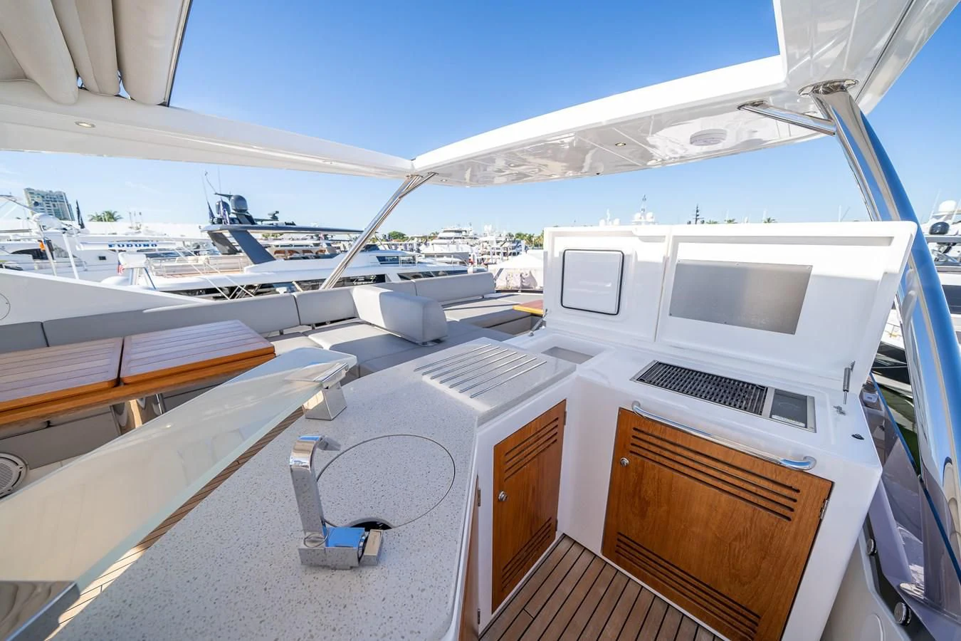 a boat deck with a deck and a deck with a deck and a view of the water and aboard 76 YACHT Yacht for Sale