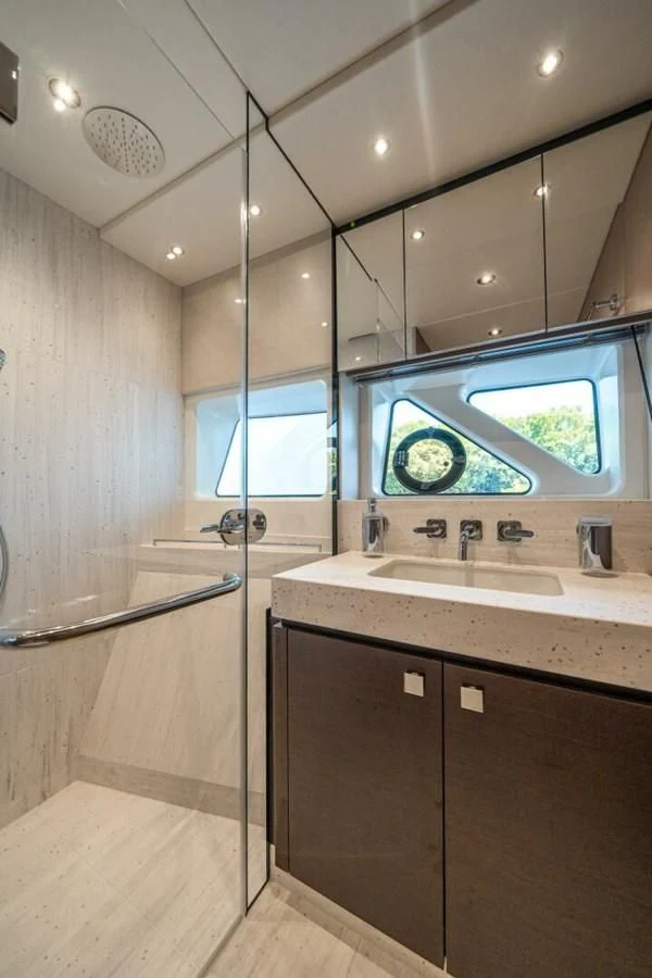 a bathroom with a large mirror aboard 76 YACHT Yacht for Sale