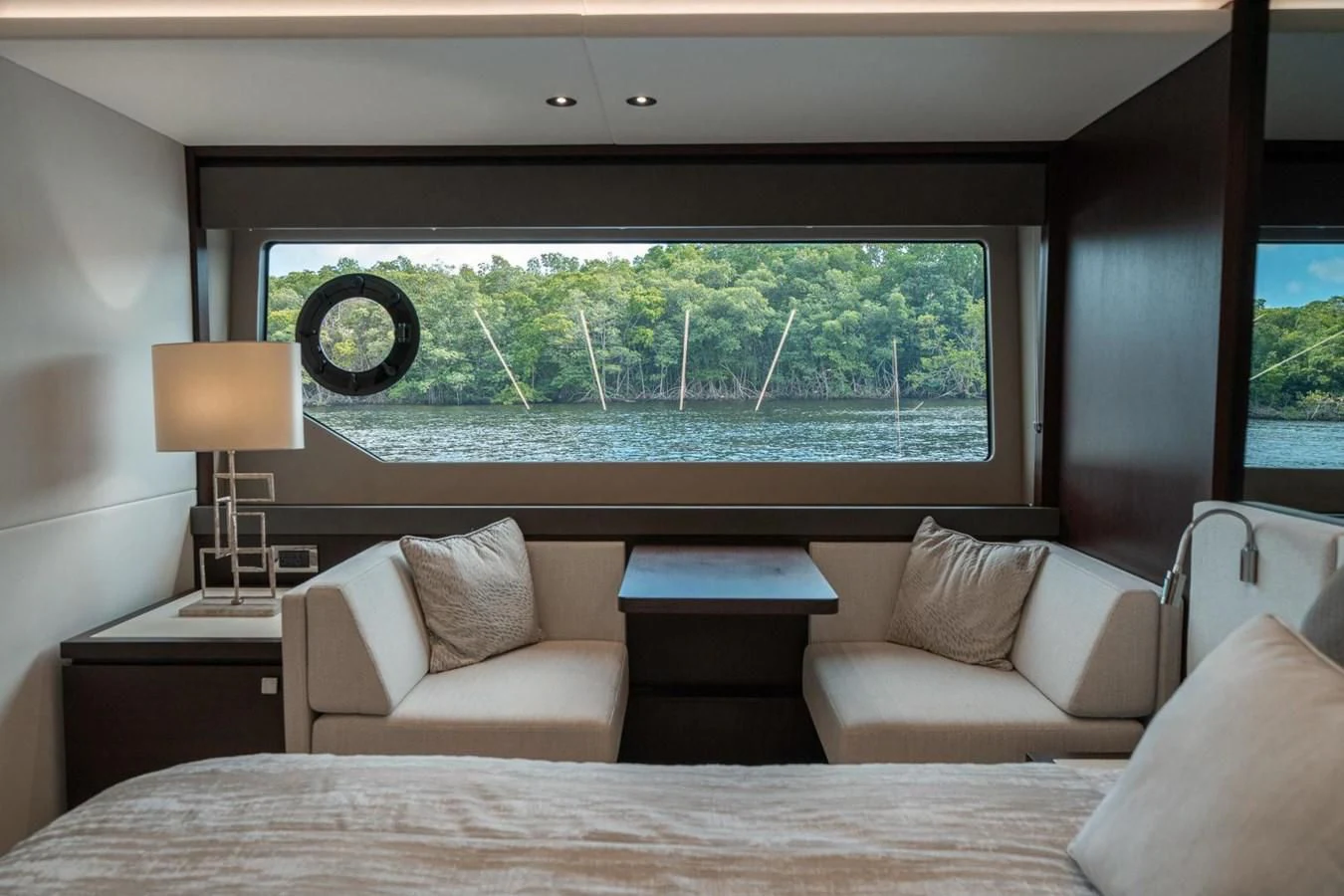a bed with a large window aboard 76 YACHT Yacht for Sale