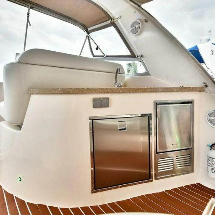 a white boat with a door aboard 76 YACHT Yacht for Sale