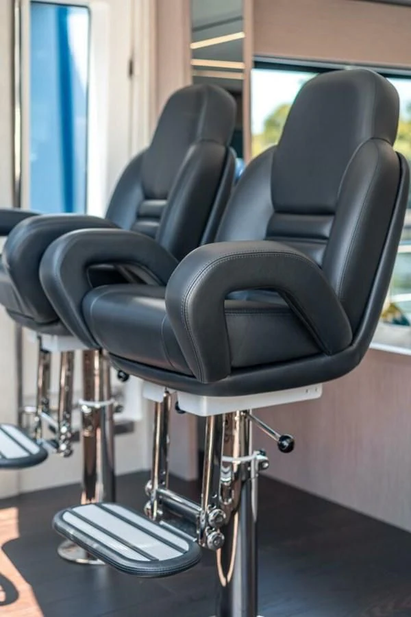 a black office chair aboard 76 YACHT Yacht for Sale