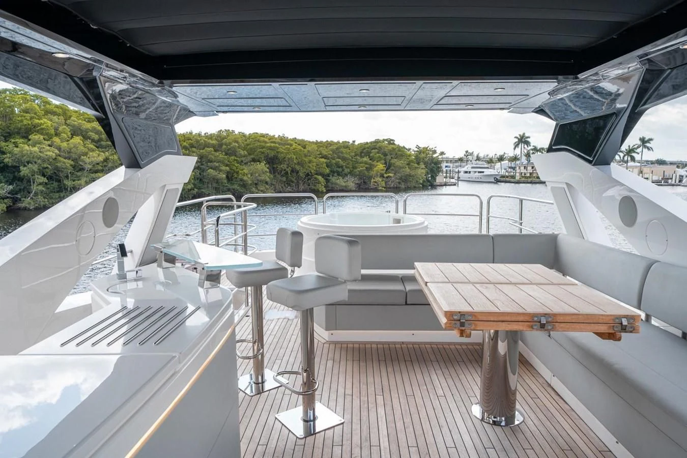 a room with tables and chairs aboard 76 YACHT Yacht for Sale