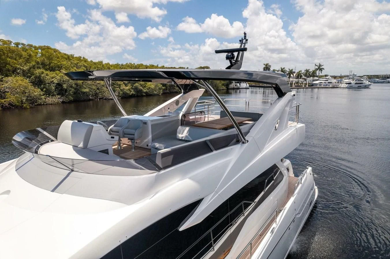 a boat with a helicopter flying over it aboard 76 YACHT Yacht for Sale