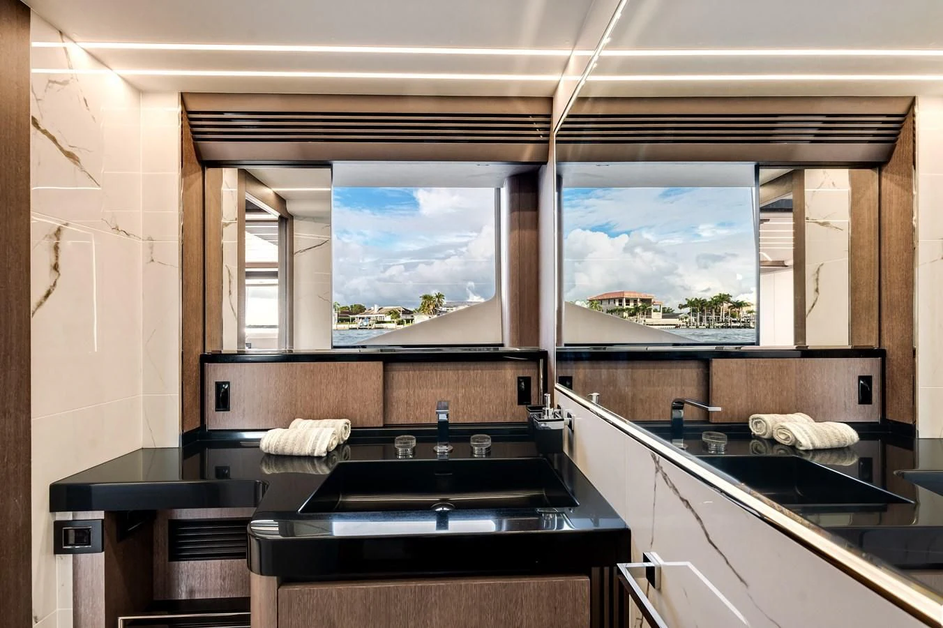 a kitchen with a large window aboard 76 YACHT Yacht for Sale