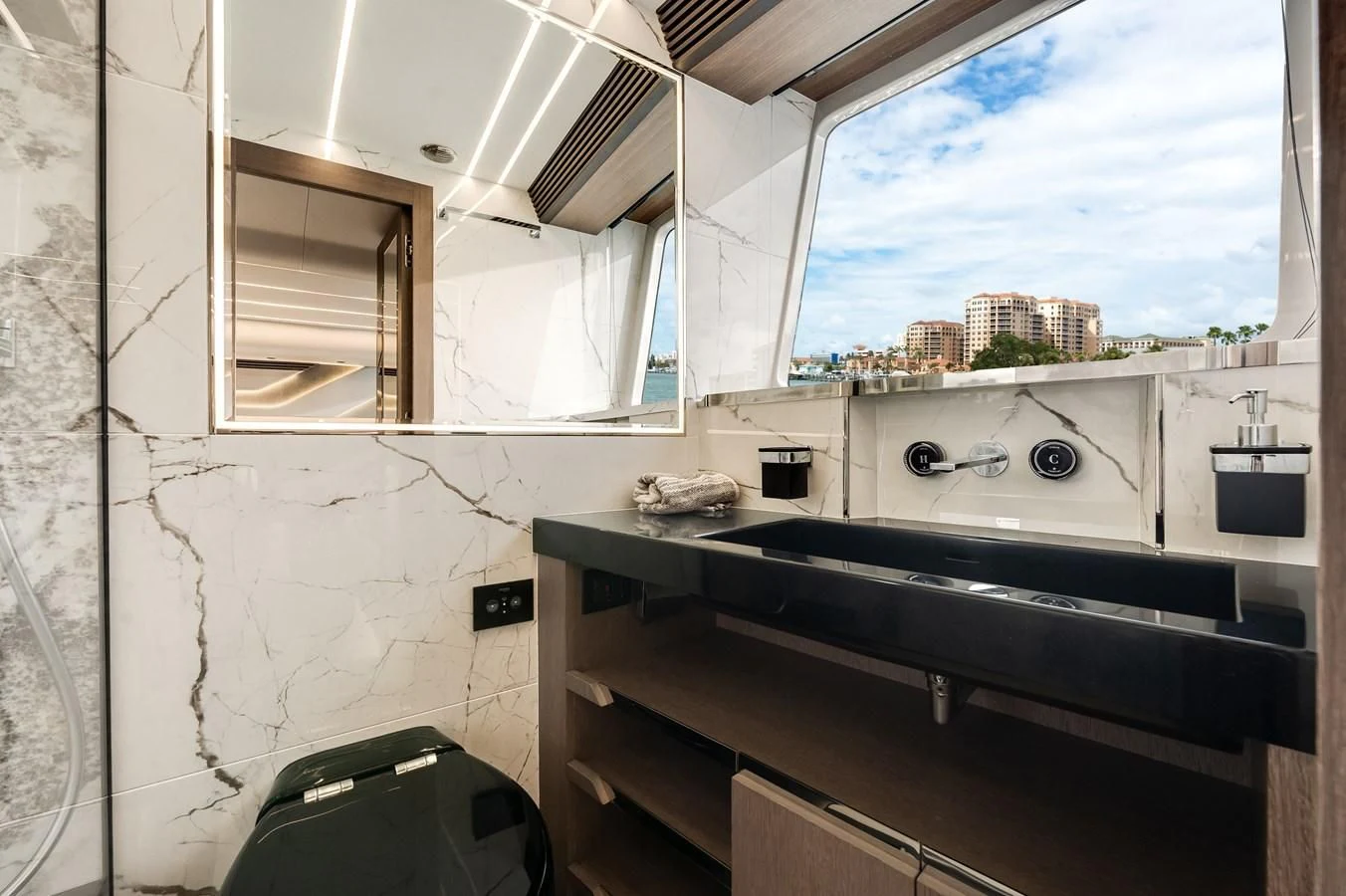 a kitchen with a large window aboard 76 YACHT Yacht for Sale