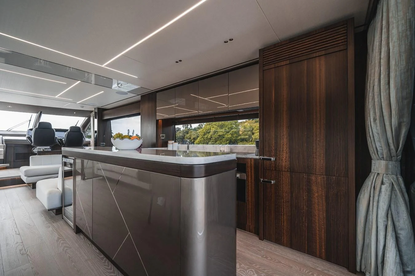 a room with a table and chairs aboard 76 YACHT Yacht for Sale