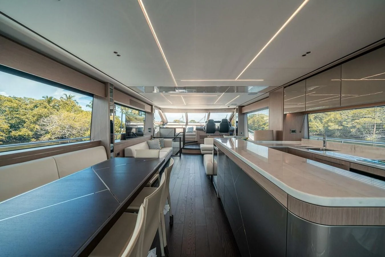 a room with a table and chairs aboard 76 YACHT Yacht for Sale