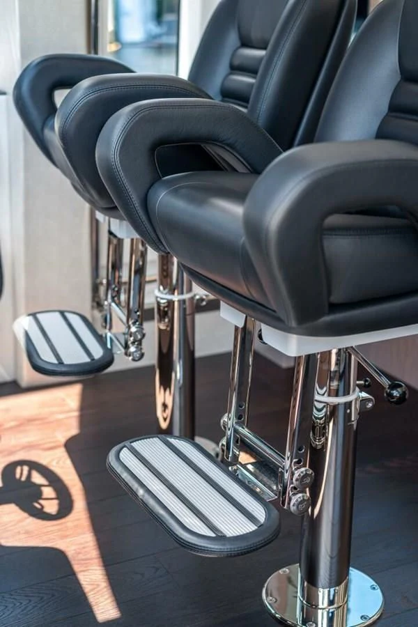 a black office chair aboard 76 YACHT Yacht for Sale