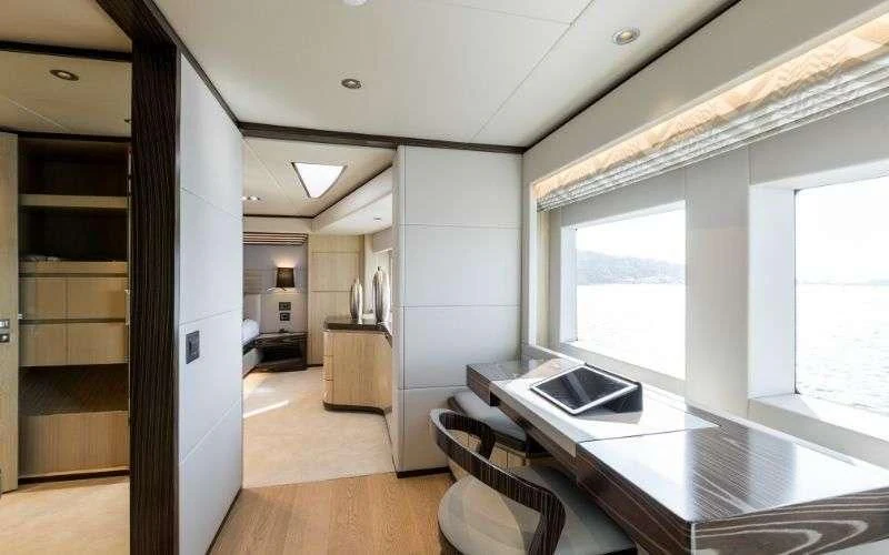 a large open kitchen and dining area aboard ONEWORLD Yacht for Sale