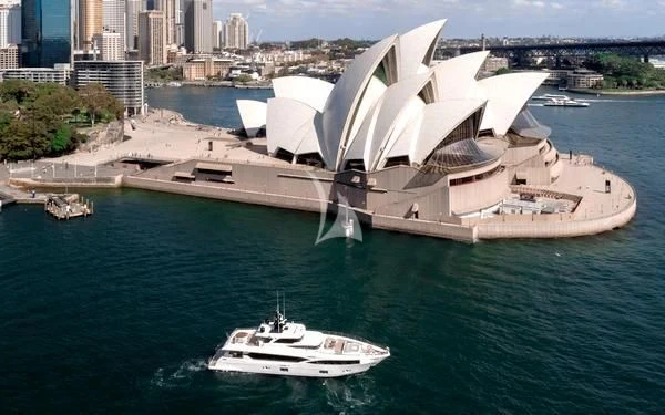 a large building with a body of water in the front aboard ONEWORLD Yacht for Sale