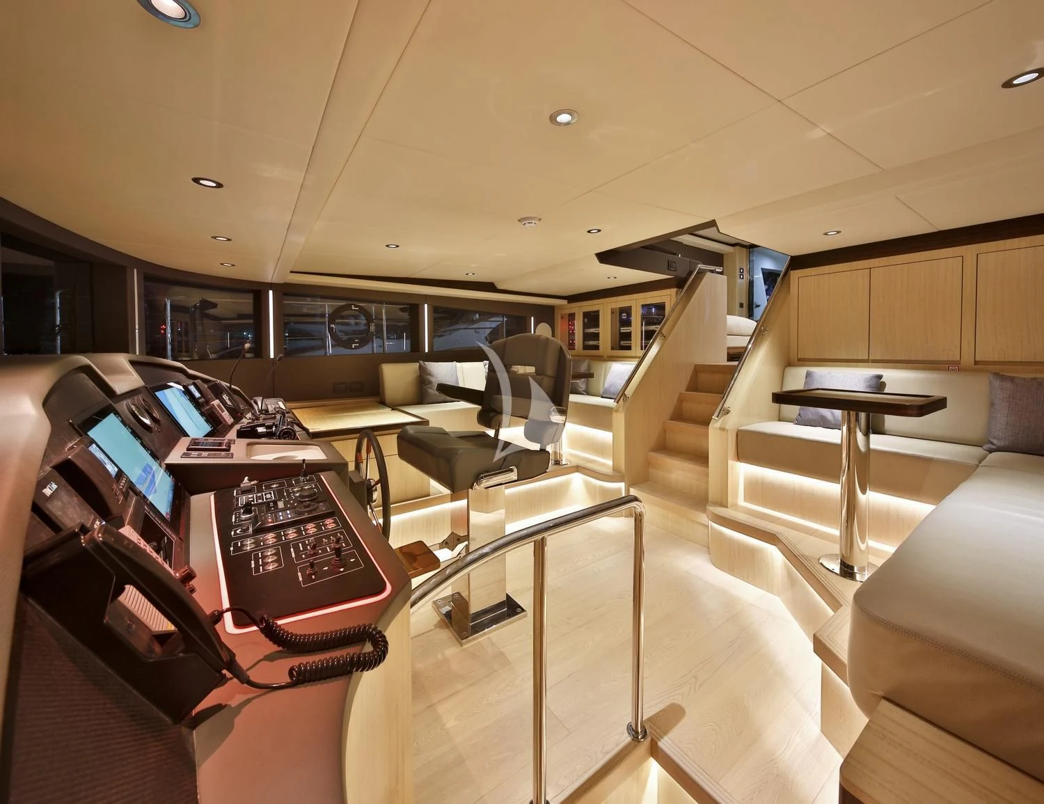 inside of a vehicle with desks and chairs aboard ONEWORLD Yacht for Sale