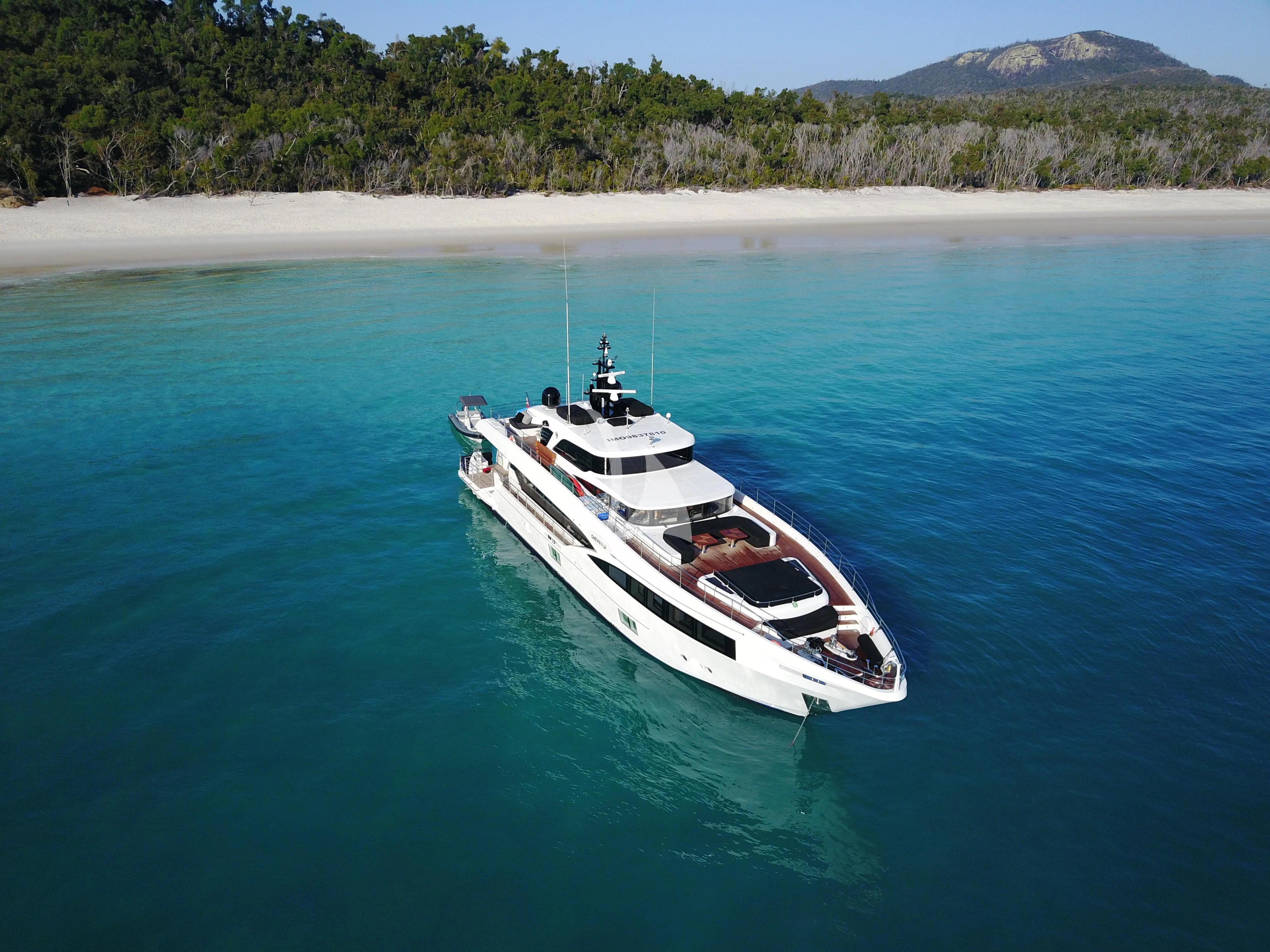 a boat on the water aboard ONEWORLD Yacht for Sale