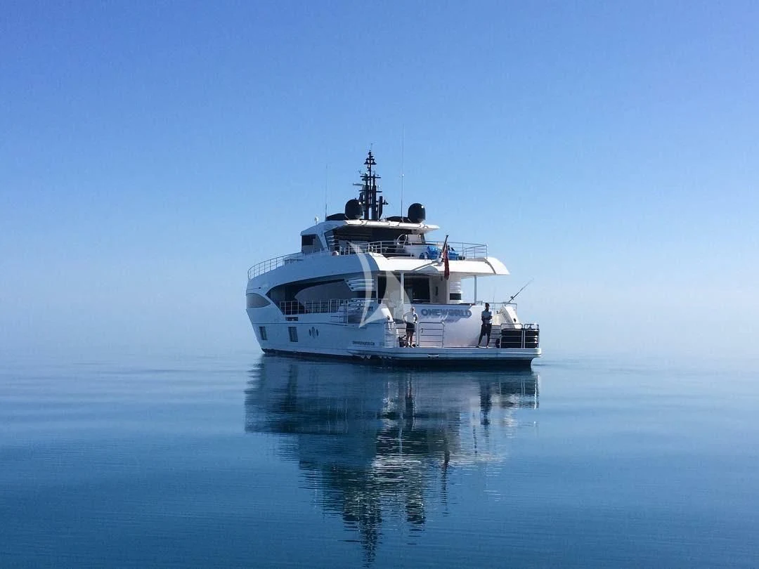 a boat in the water aboard ONEWORLD Yacht for Sale