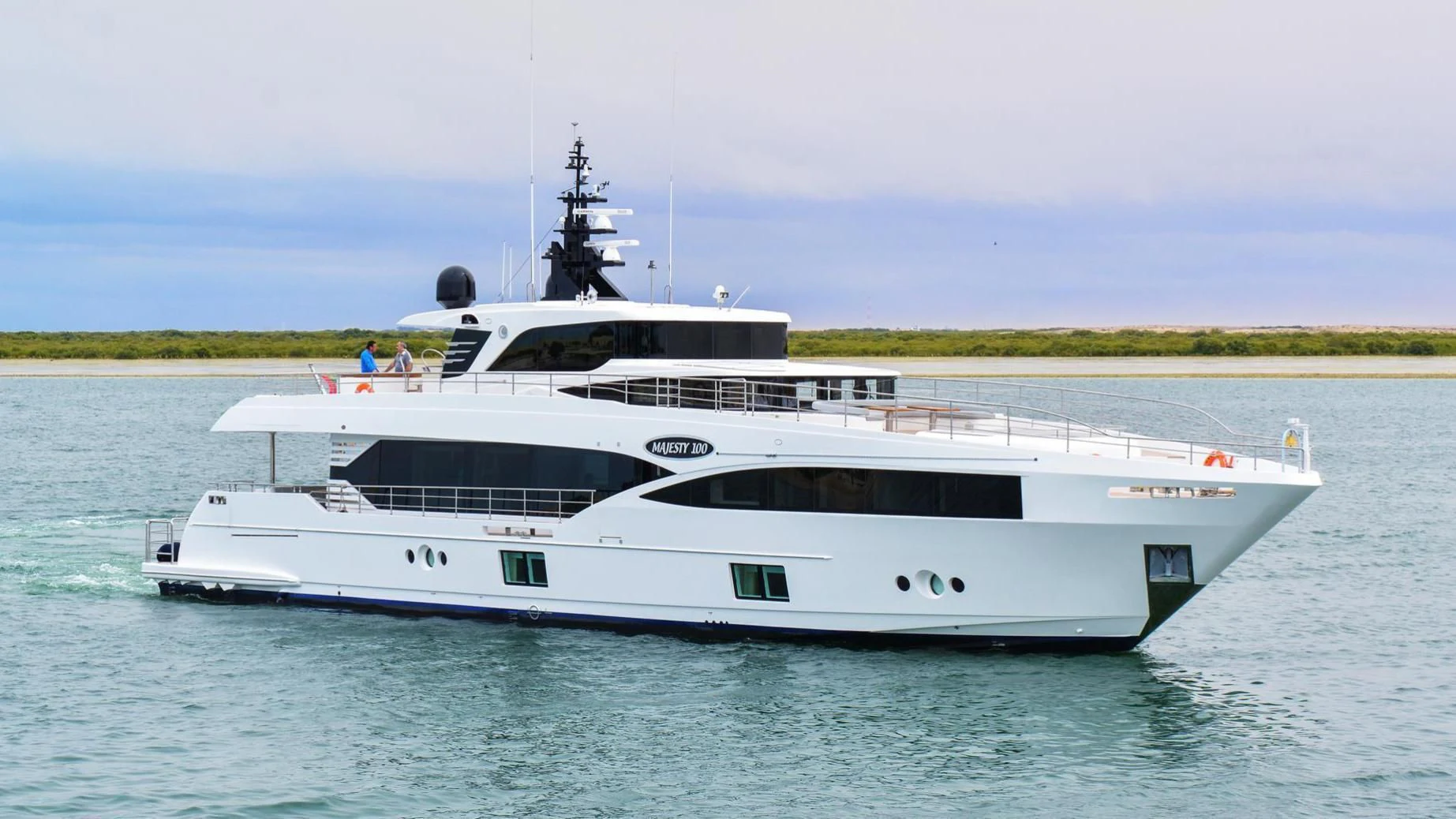 a large white boat in the water aboard ONEWORLD Yacht for Sale