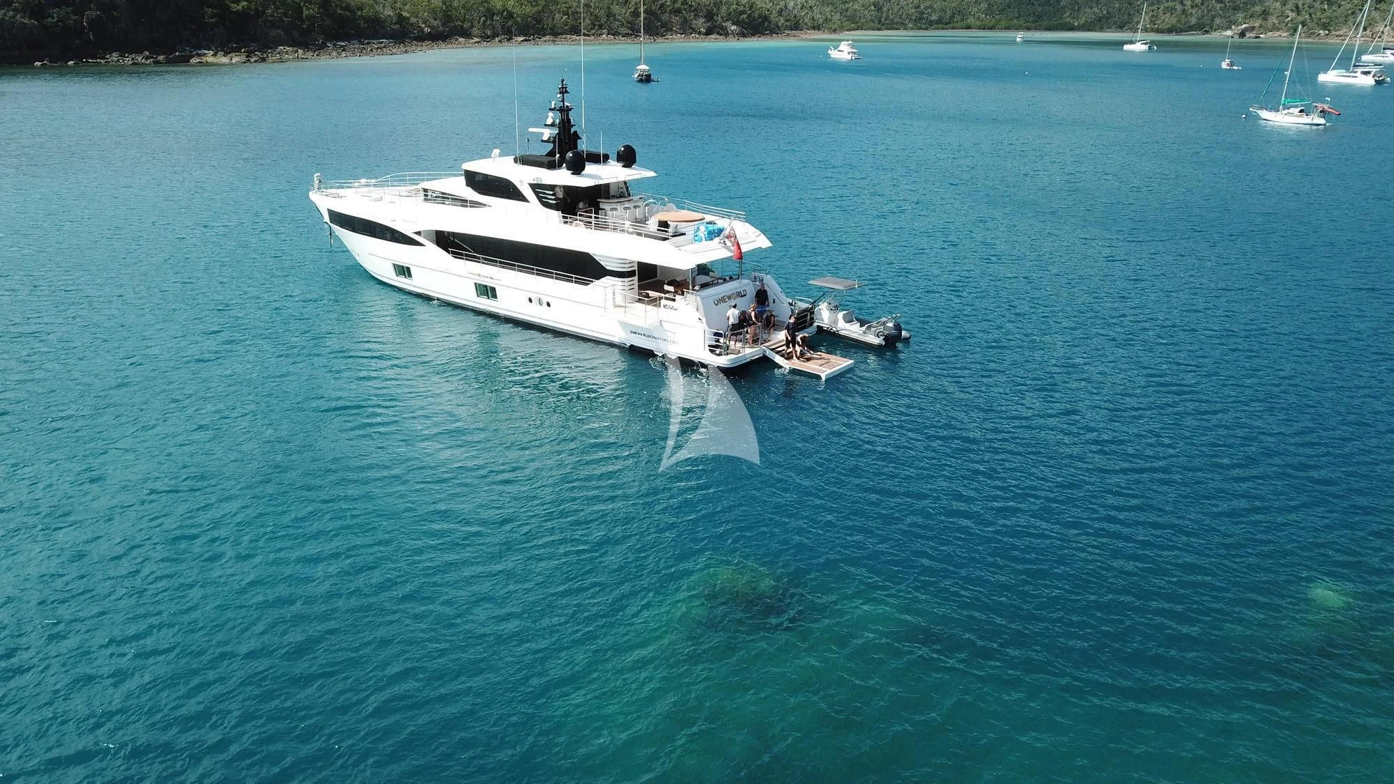 a boat on the water aboard ONEWORLD Yacht for Sale