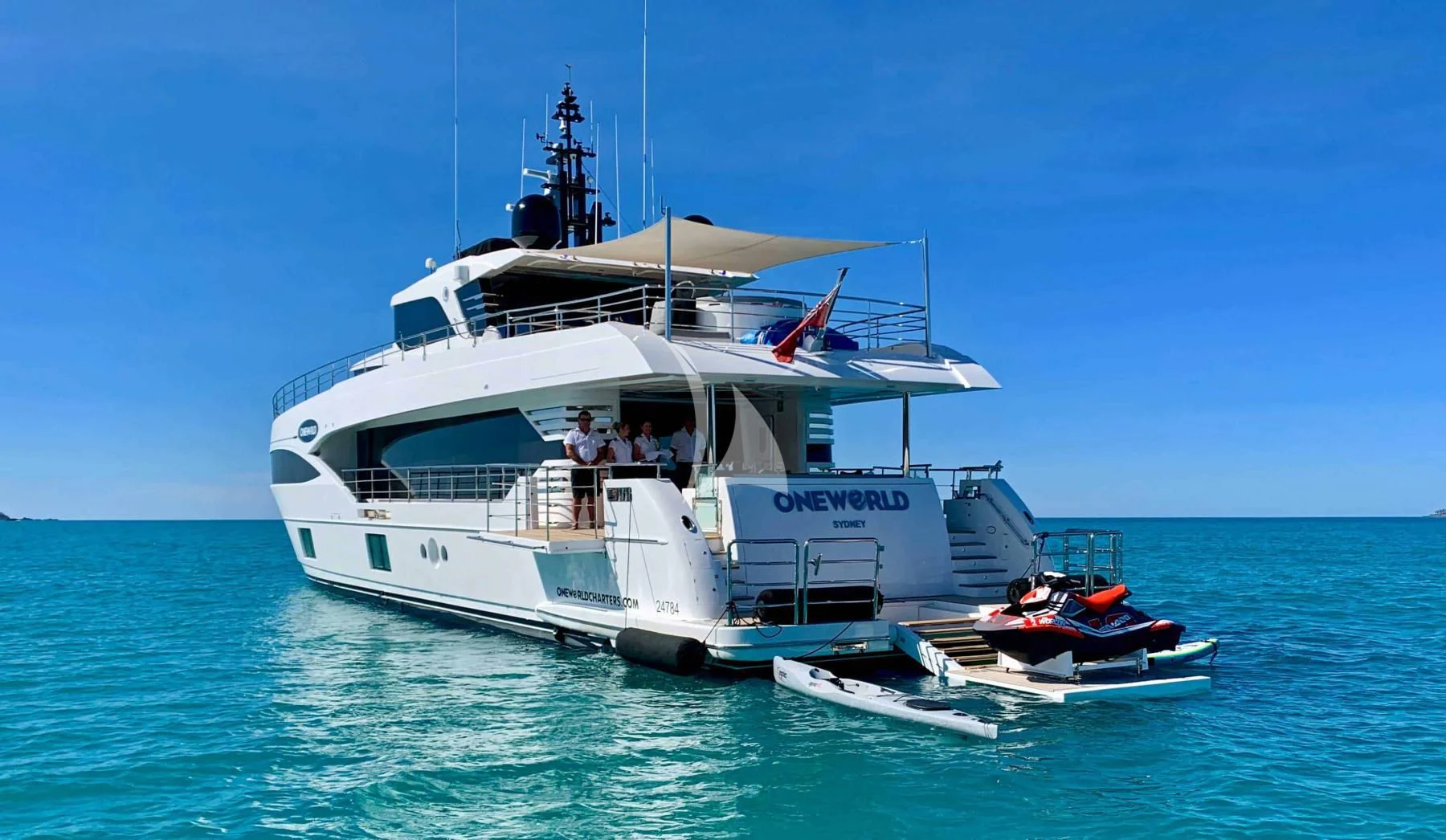 a boat in the water aboard ONEWORLD Yacht for Sale