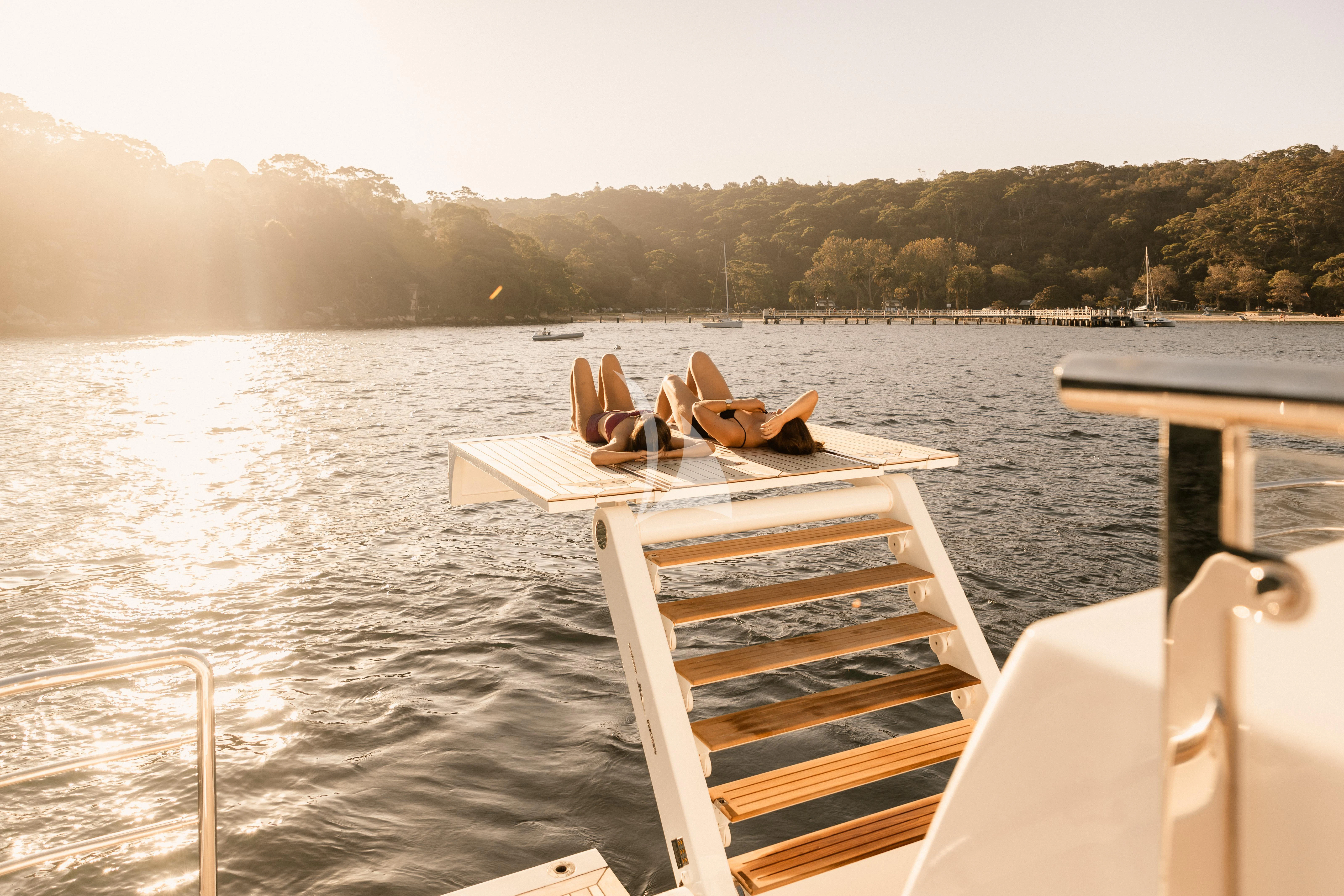 a boat on the water aboard ONEWORLD Yacht for Sale