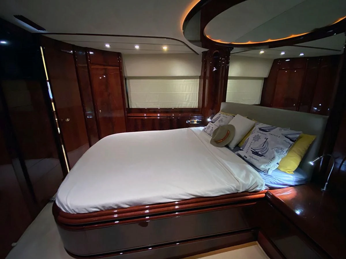a couple of beds sit near each other aboard SPEED 5 Yacht for Sale