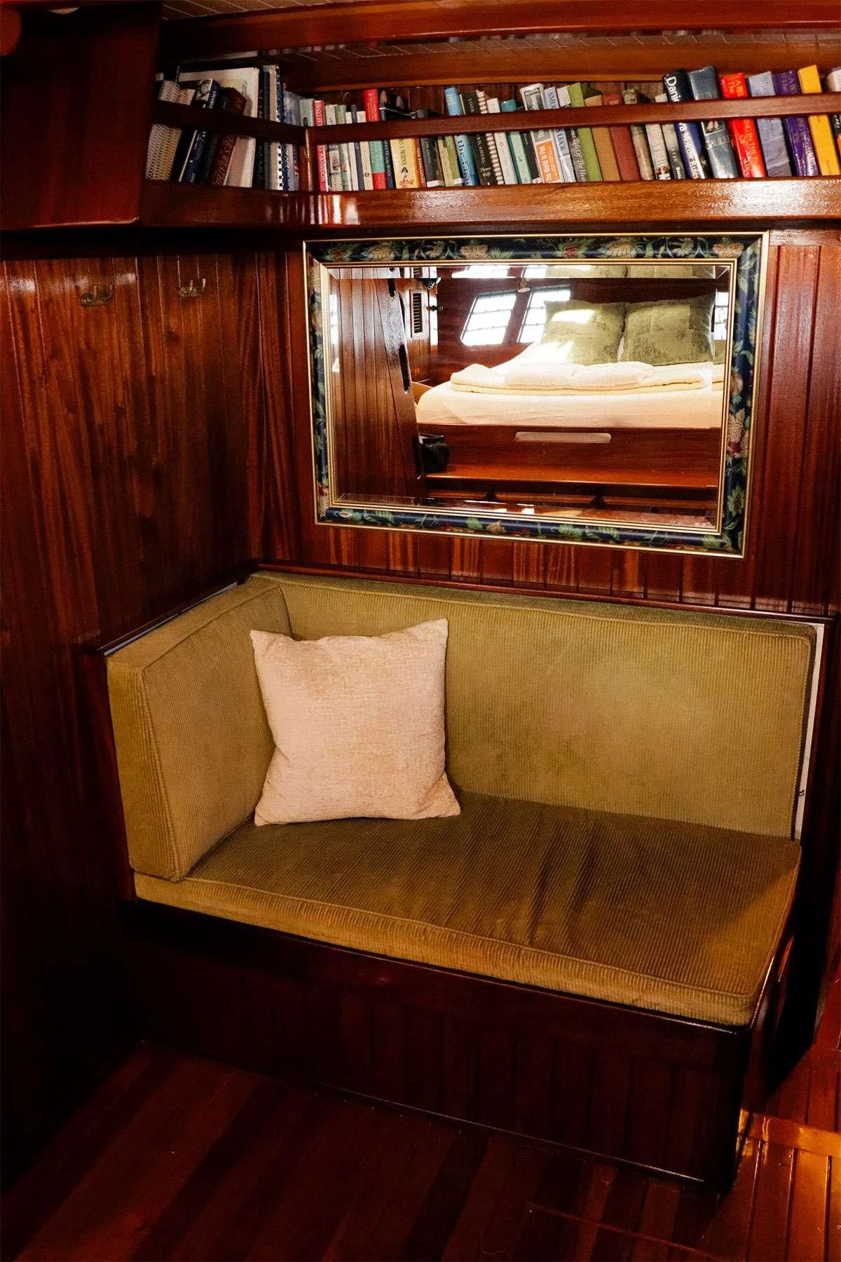 a fireplace with a mirror above it aboard TREE OF LIFE Yacht for Sale