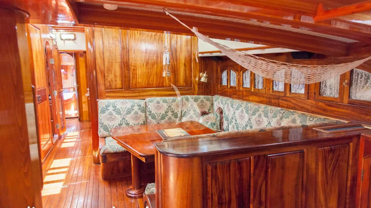 a kitchen with wooden cabinets aboard TREE OF LIFE Yacht for Sale