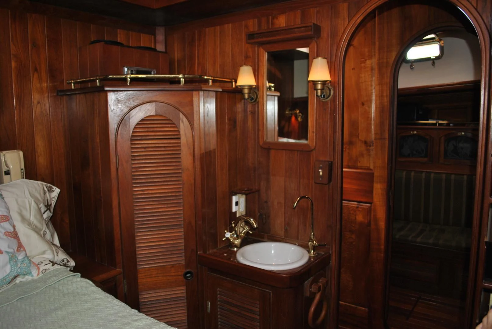 a bathroom with a sink and a mirror aboard TREE OF LIFE Yacht for Sale