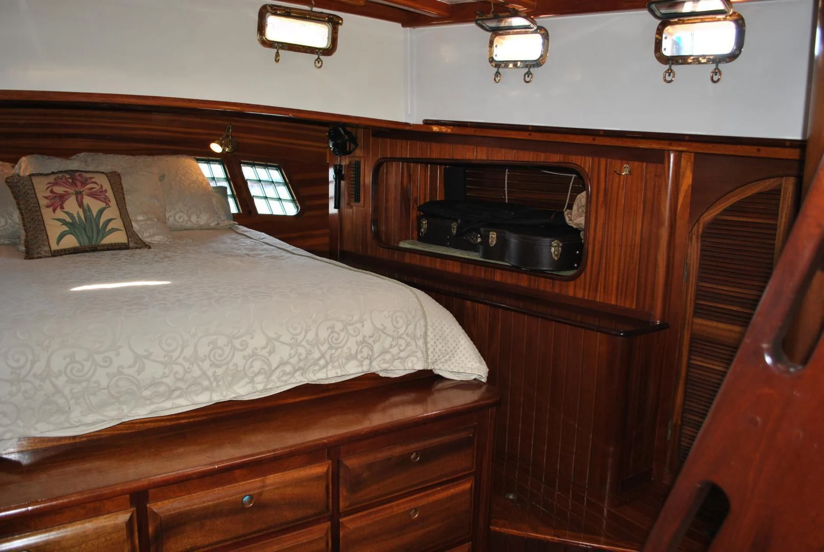 a bed with a microwave on top of it aboard TREE OF LIFE Yacht for Sale
