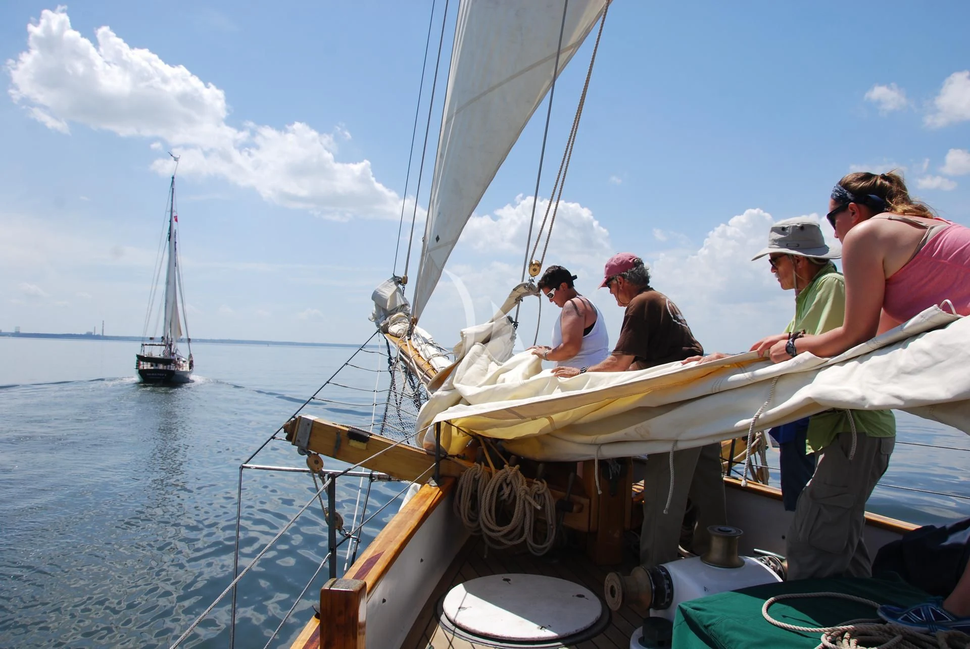 a group of people on a sailboat aboard TREE OF LIFE Yacht for Sale