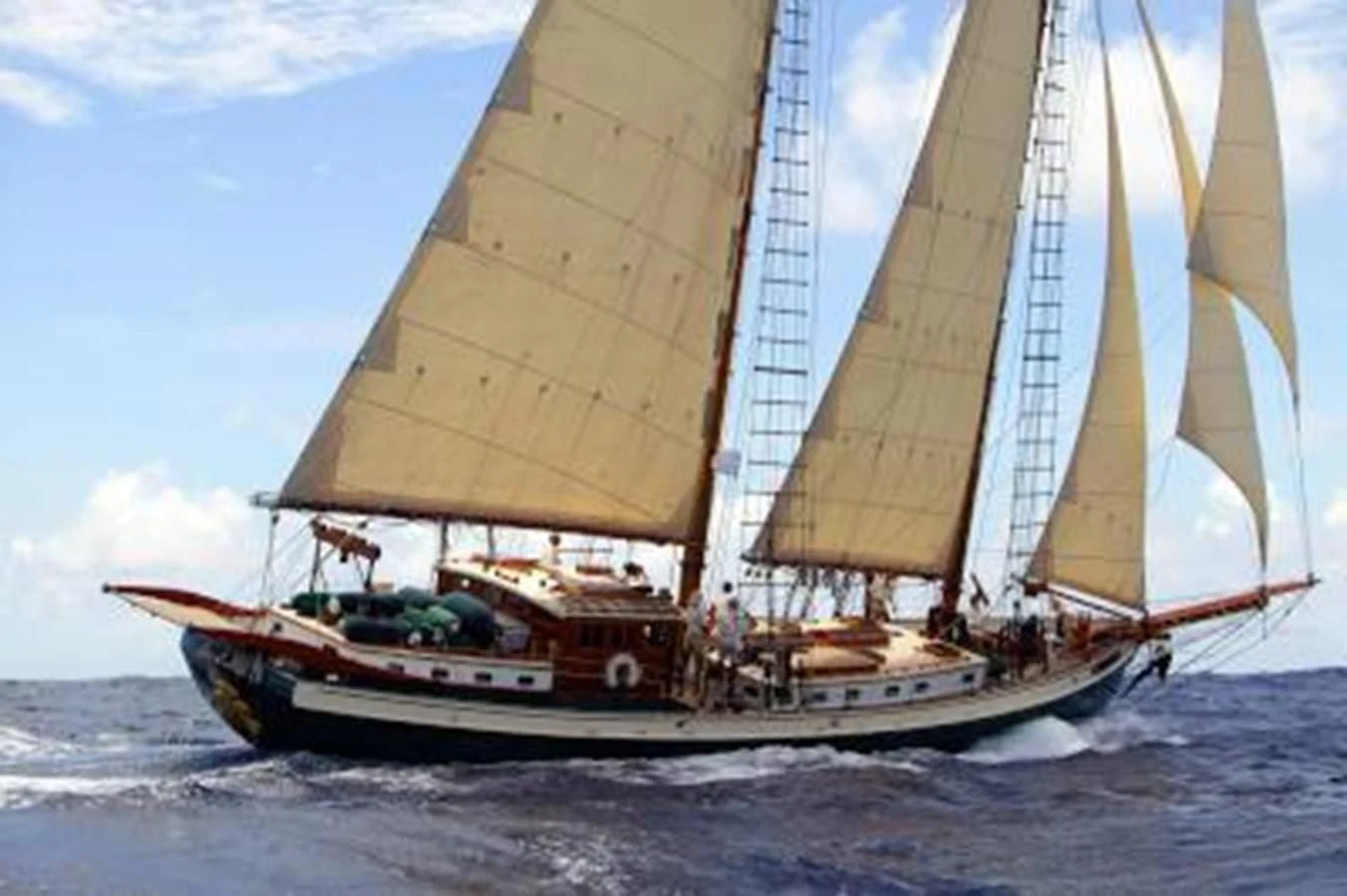 a boat sailing on the sea aboard TREE OF LIFE Yacht for Sale