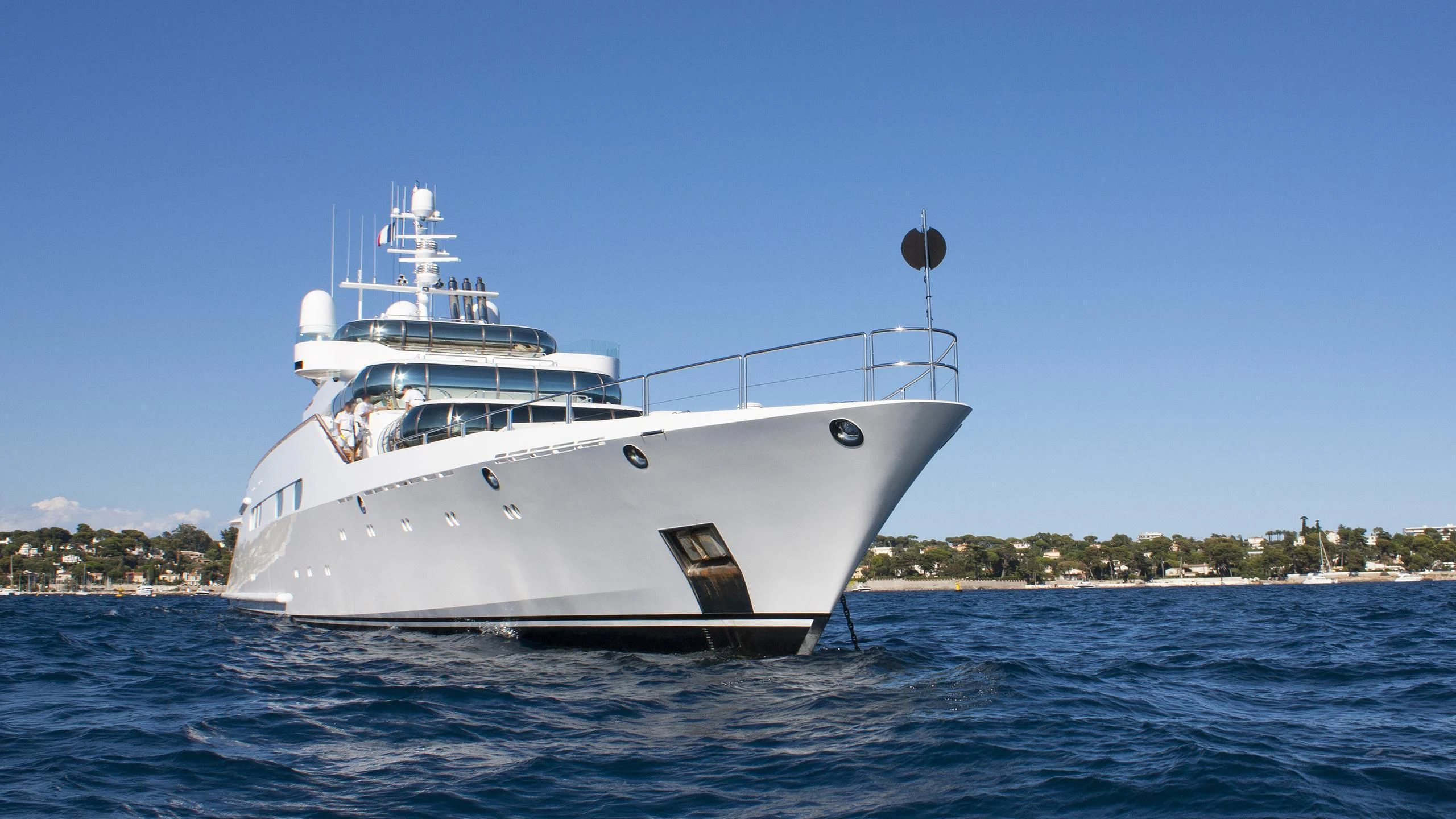 a white boat in the water aboard ZEUS Yacht for Sale