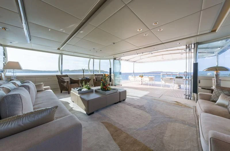 a living room with a large window aboard ZEUS Yacht for Sale