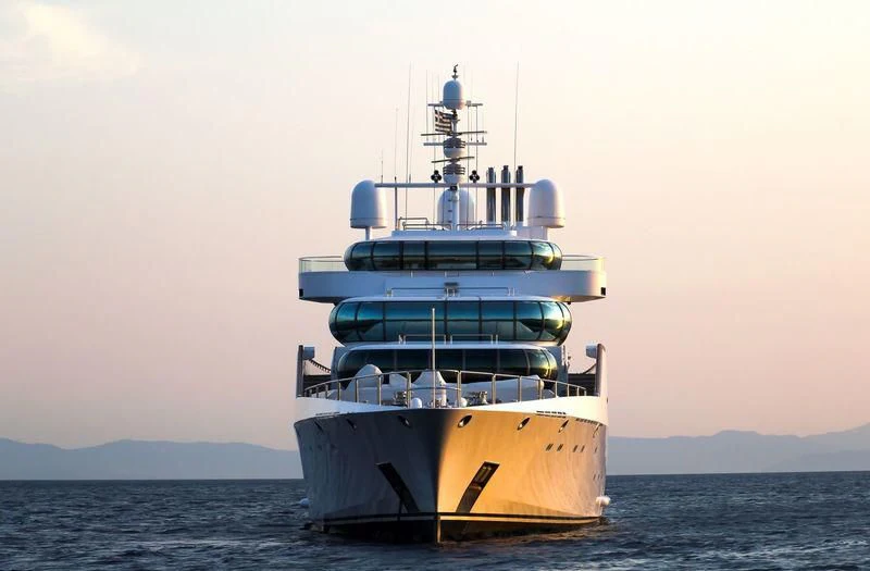 a large ship in the water aboard ZEUS Yacht for Sale